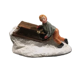 Kerstdorp>Kerstdorp jongen met slee