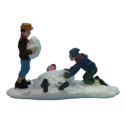 Kerstdorp>Kerstdorp kinderen in sneeuw